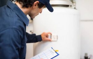 Residential plumbing service - so cal PHAC - Plumber repairing an hot water heater